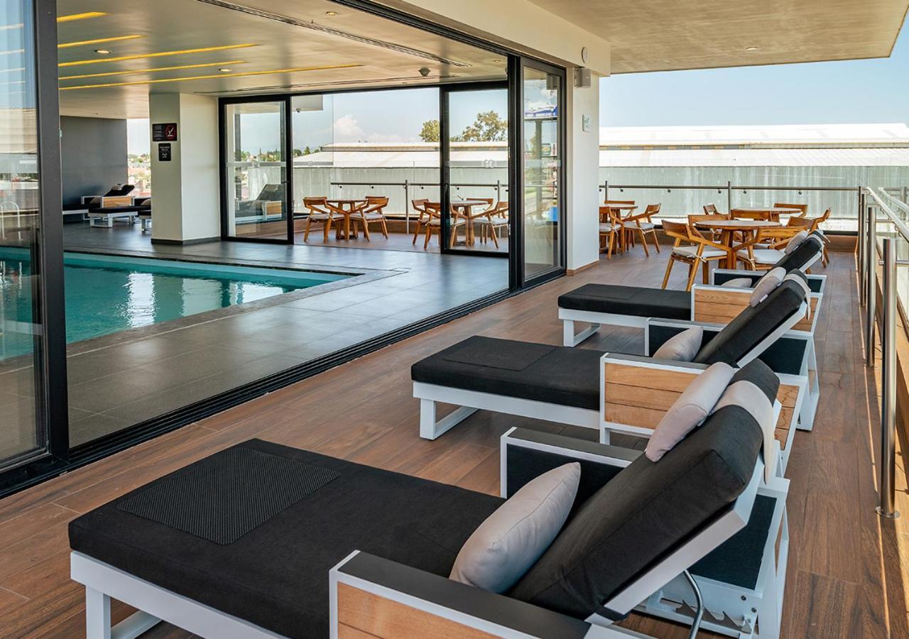 Ramada Encore By Wyndham Guadalajara Aeropuerto Las Pintas Экстерьер фото